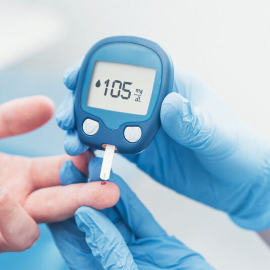 Blood sugar monitor picking a finger