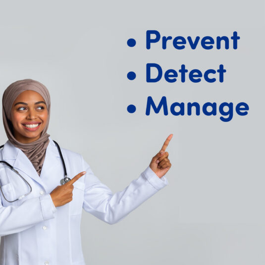 Female doctor point to the words prevent, detect and manage