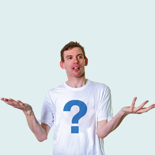 man wearing a t-shirt with an exclamation mark