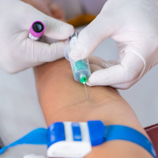 Needle being inserted into arm for a blood test