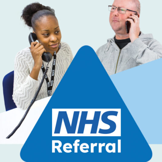 female health care worker on the phone to male patient for a NHS referral