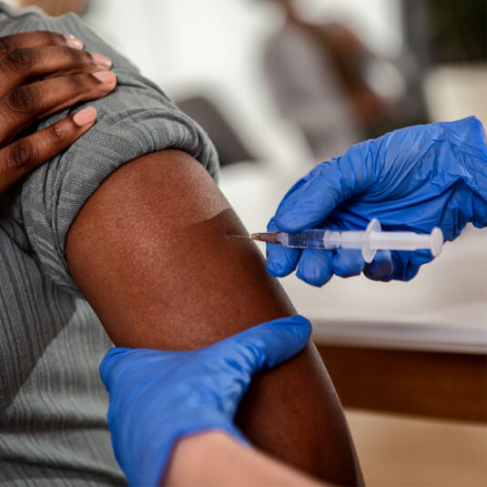 A person receiving an injection