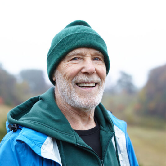 older male smiling