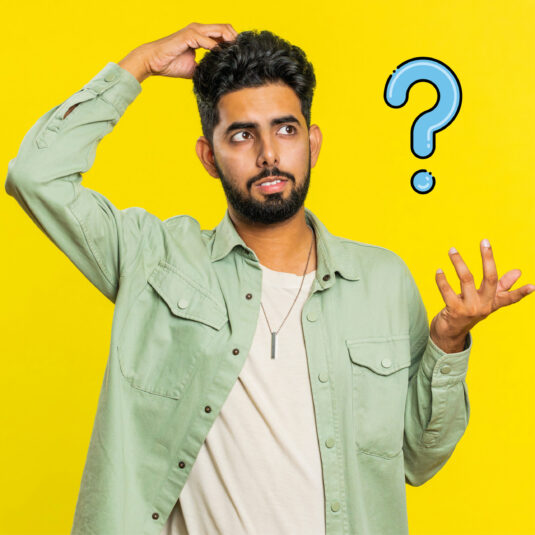Person shrugging beside a question mark in a yellow background