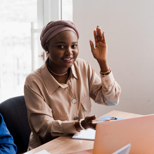 Woman raising her hand