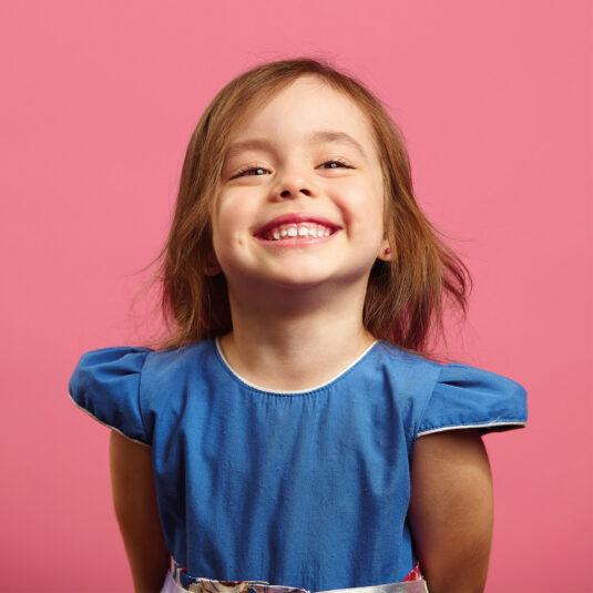 Young girl smiling at the camera