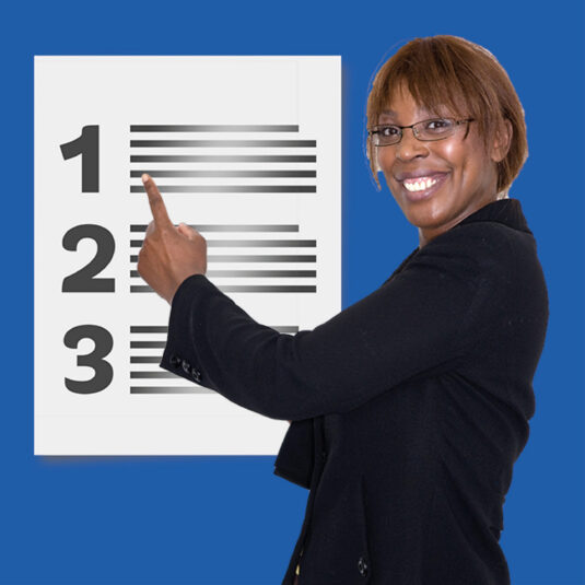 Woman pointing at a numbered checklist or ranked list on a board.