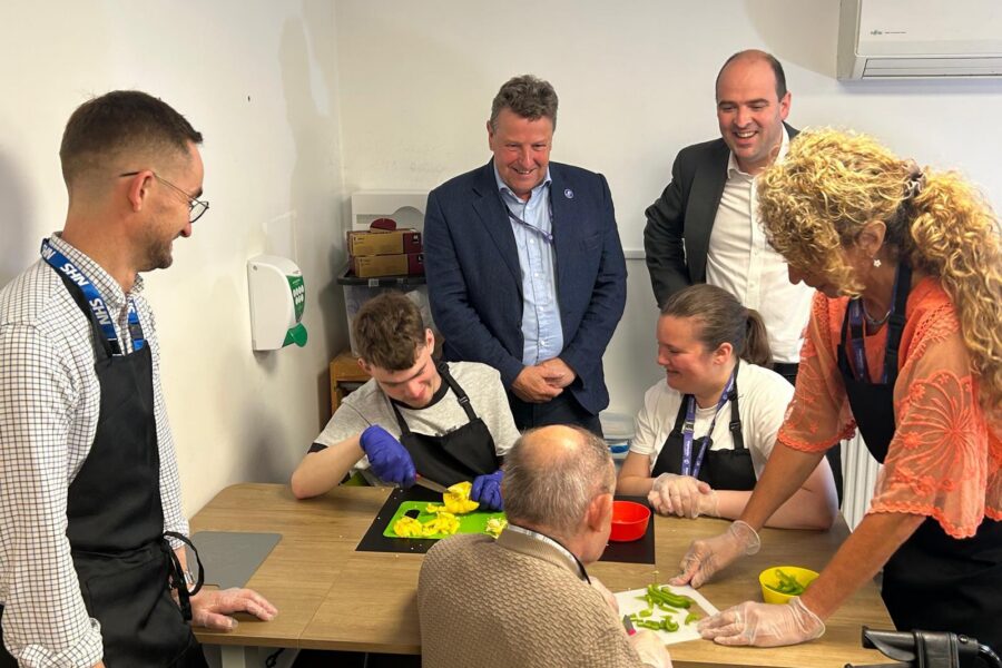 Tom Abell, Ru Watkins and MP Richard Holden take part in activities at Hamelin Trust